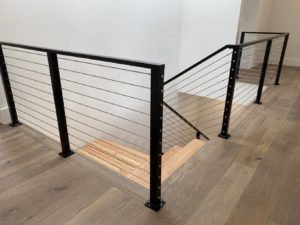 a staircase with metal railings