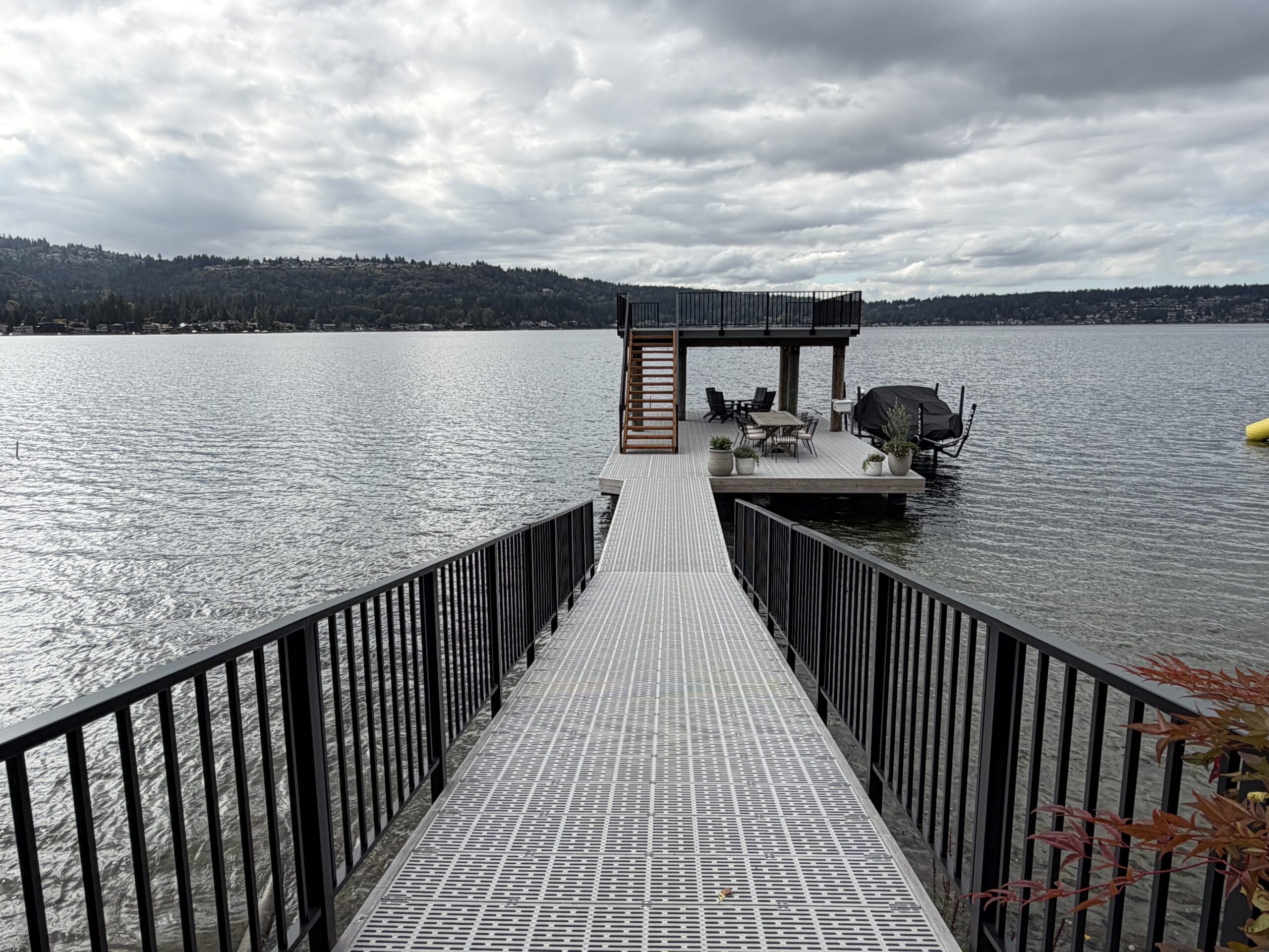 Black aluminum picket railings along the Lake Sammamish dock approach