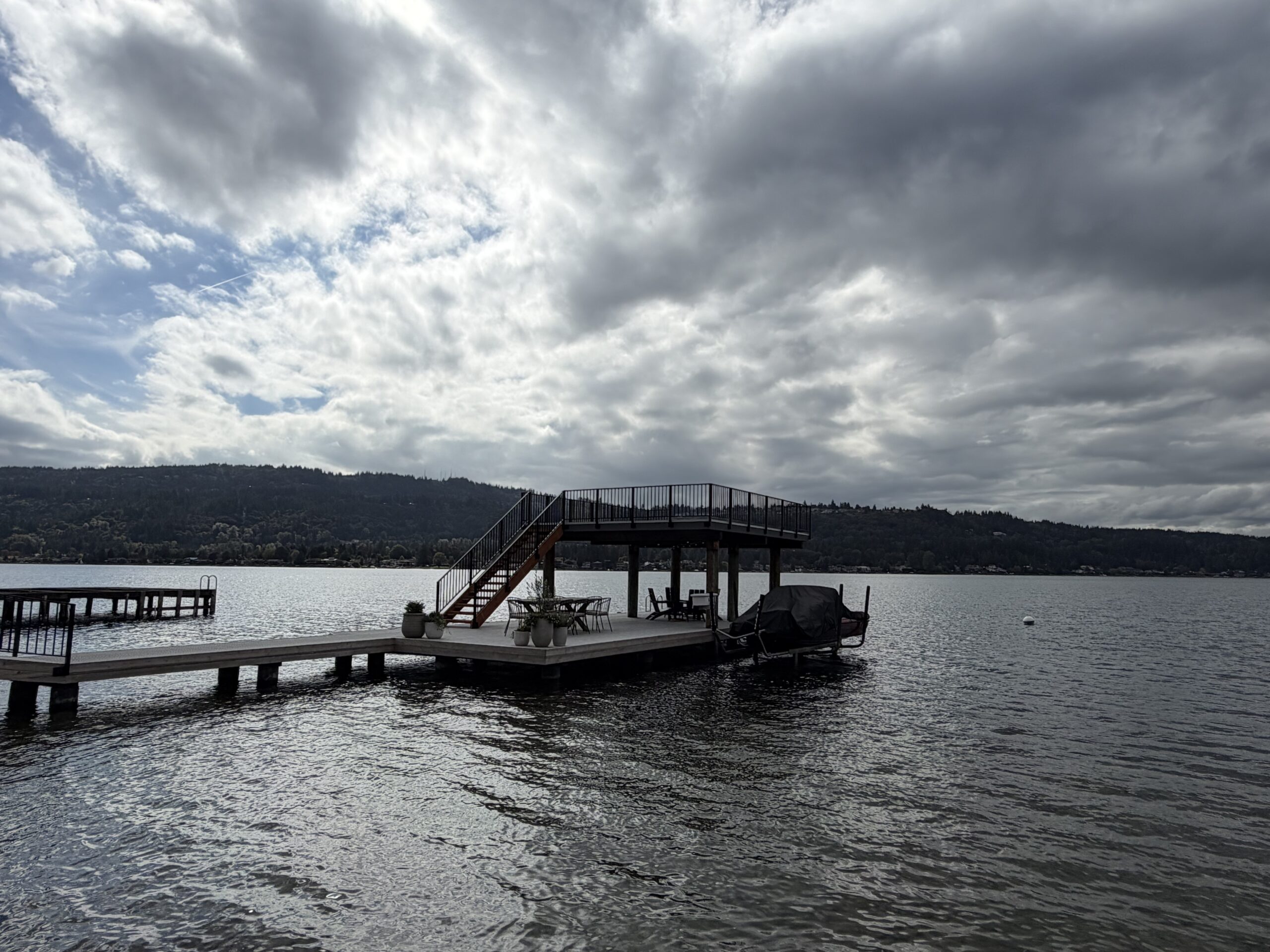 Lake Sammamish waterfront dock with raised deck and stair railings